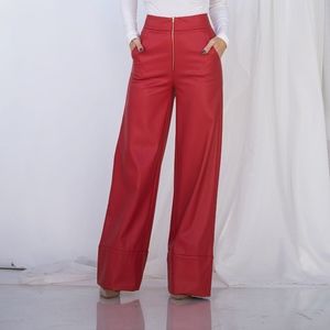 Red faux leather pants